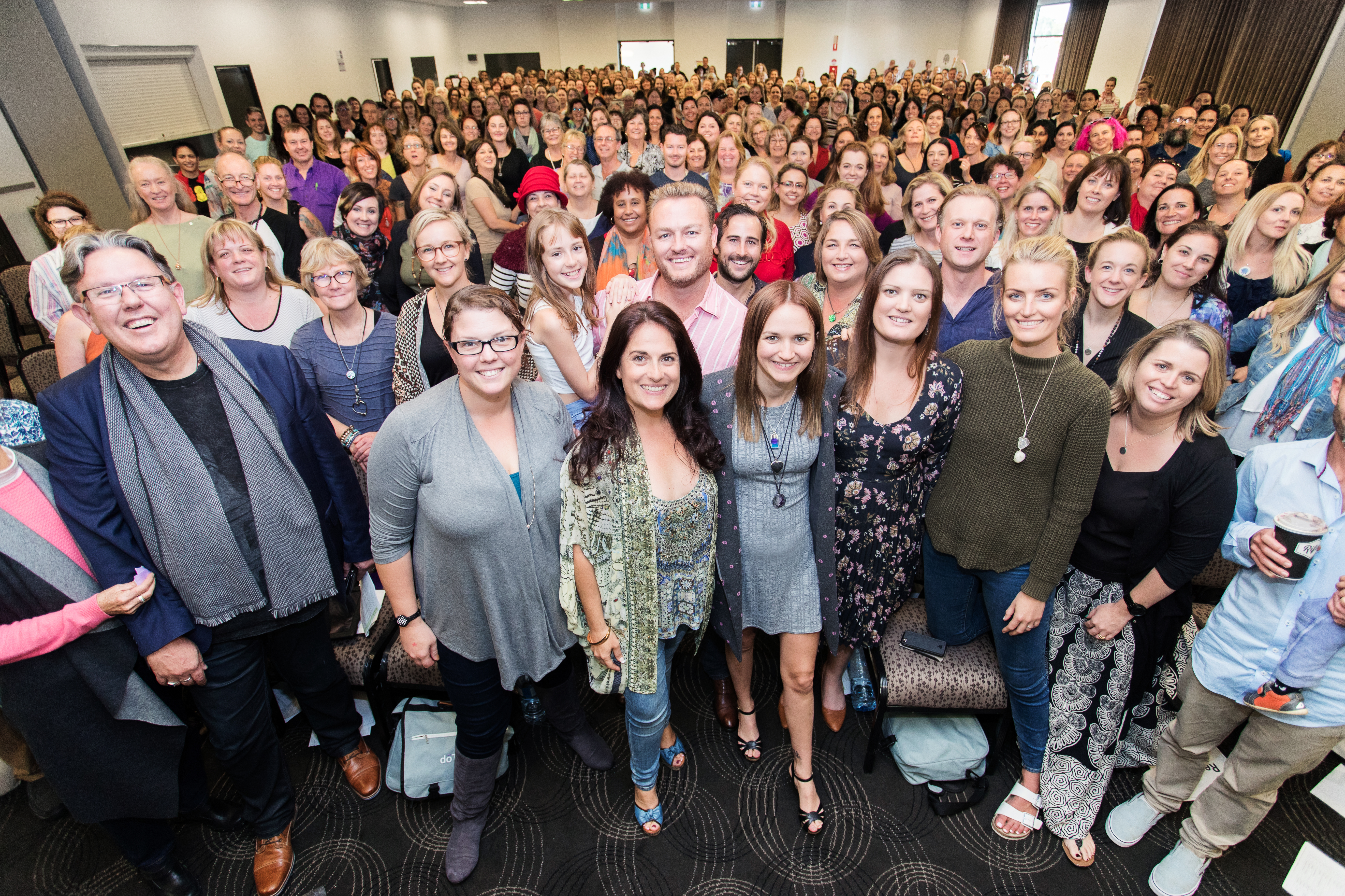 Paul and Vanessa Jean with over 400 people at their One Tree training in Perth, Australia.