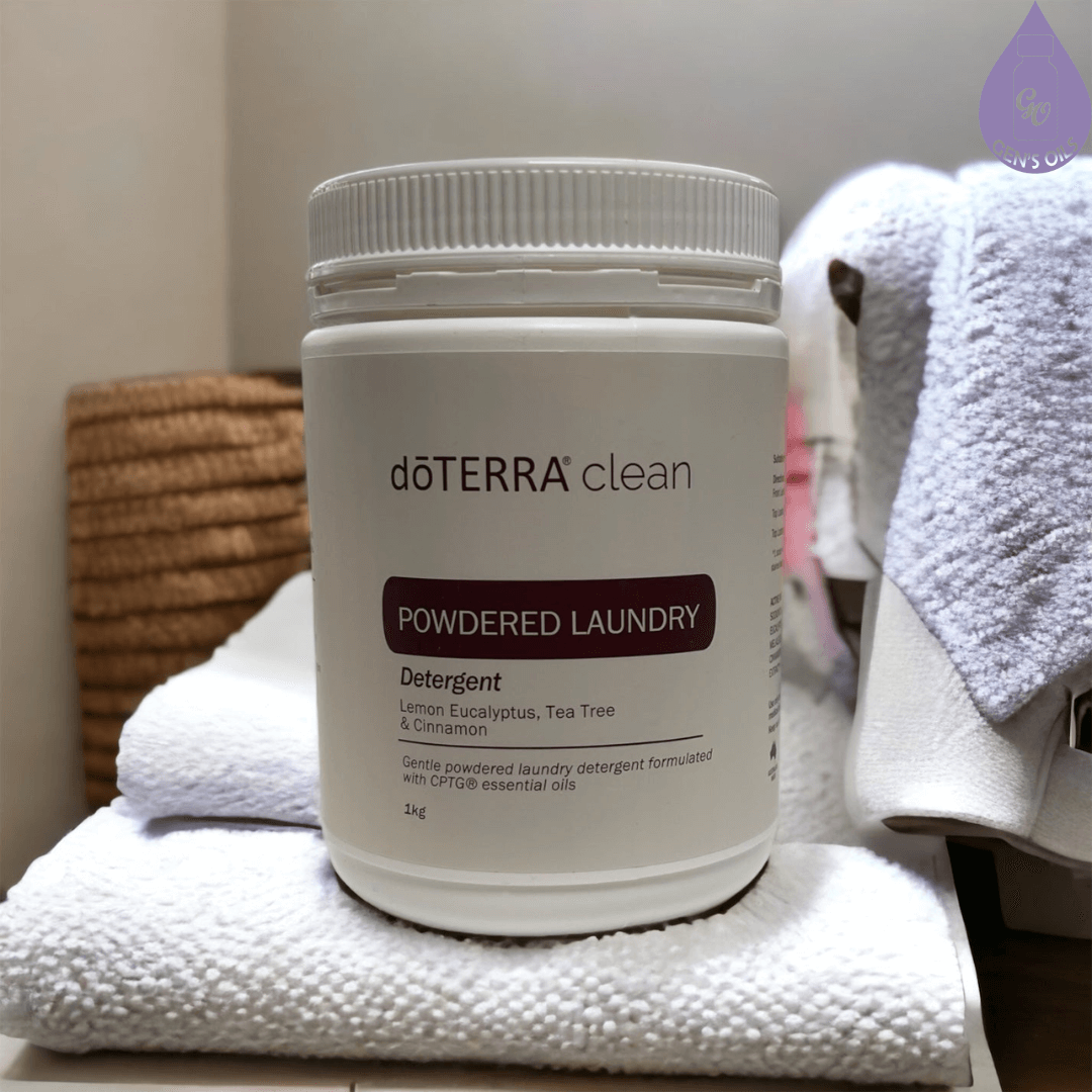 Clean Laundry Powder sitting on some folded towels.