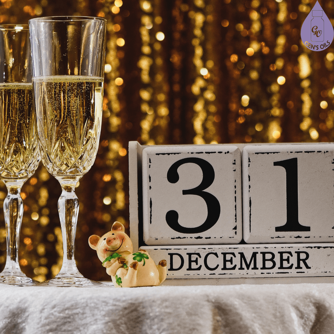 Two champaign glasses on a table beside the date 31 December