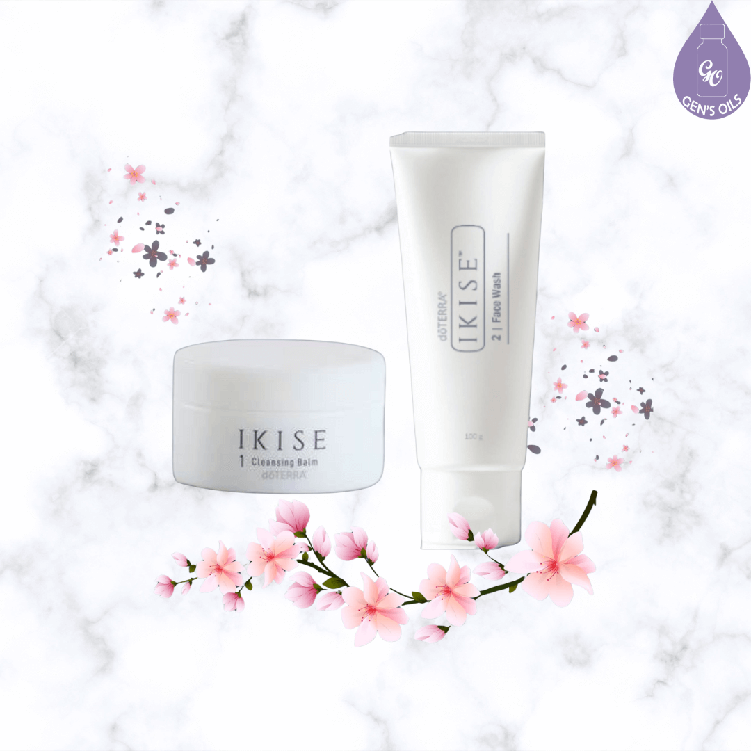 IKISE Cleansing Balm & Face Wash on a marble background with cherry blossoms.