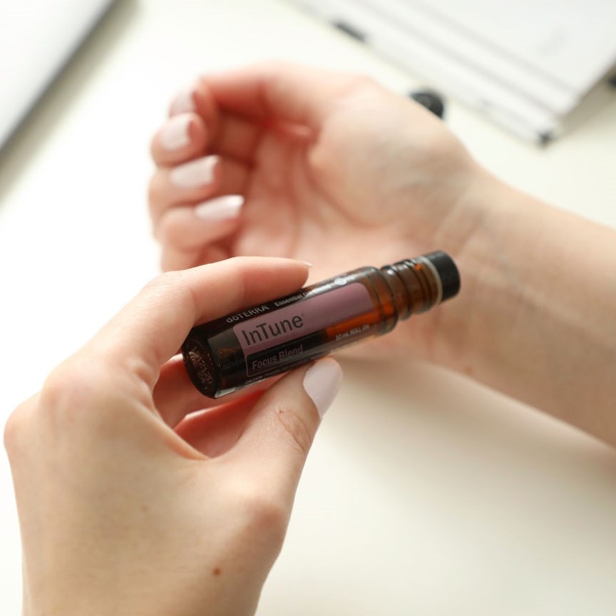 Applying inTune Focus Blend to inside of wrist.