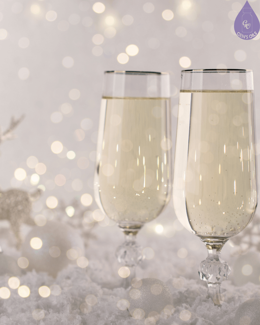 Two champagne flutes filled with bubbly liquid, set against a backdrop of soft lights.