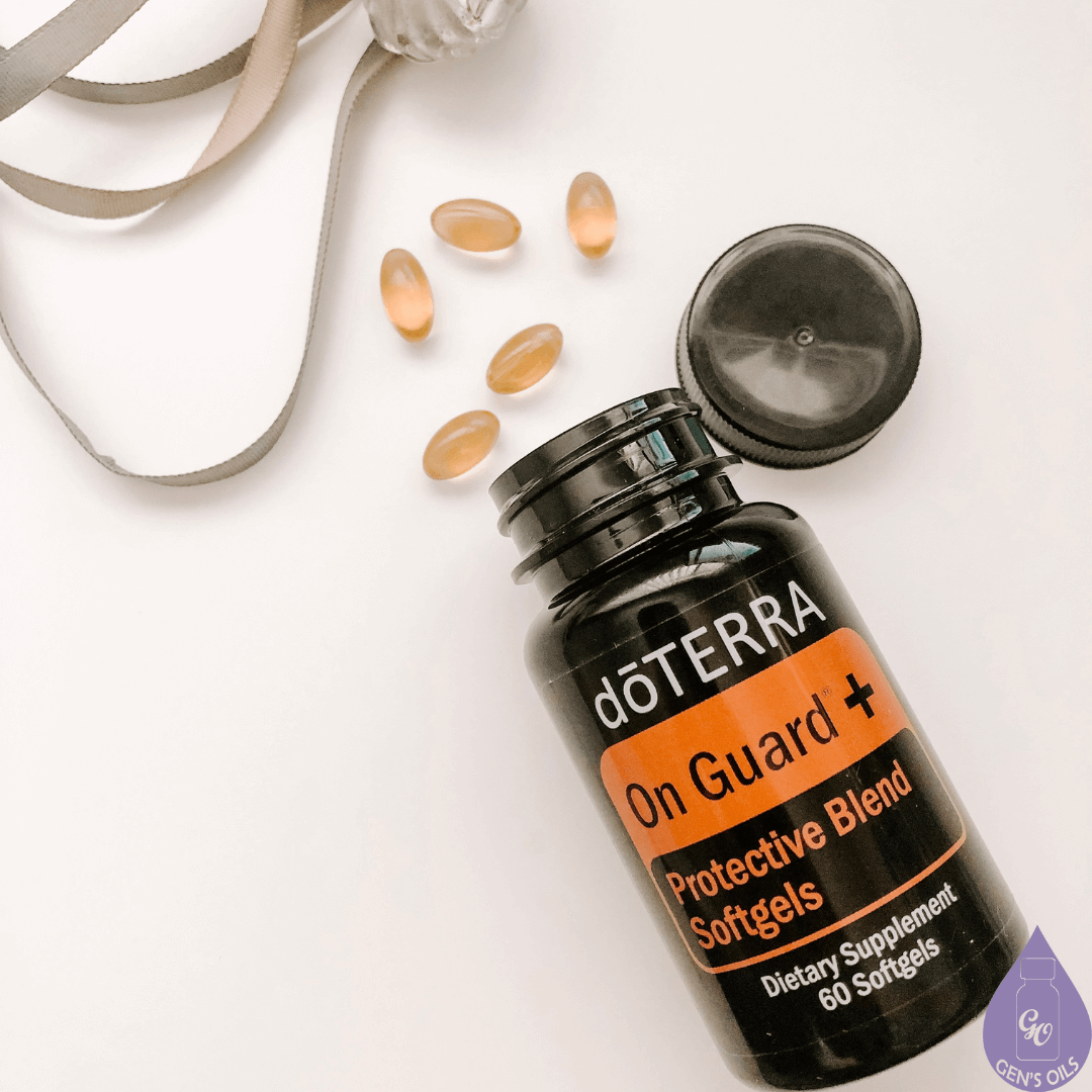 A bottle of On Guard softgels with a few spilled out