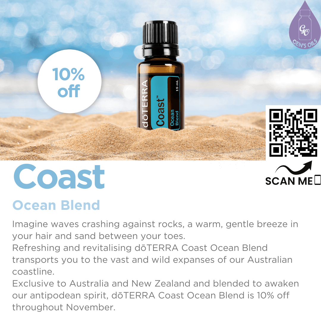 A bottle of Coast Ocean Blend essential oil on a sandy beach. The QR code opens a link to purchase this blend.