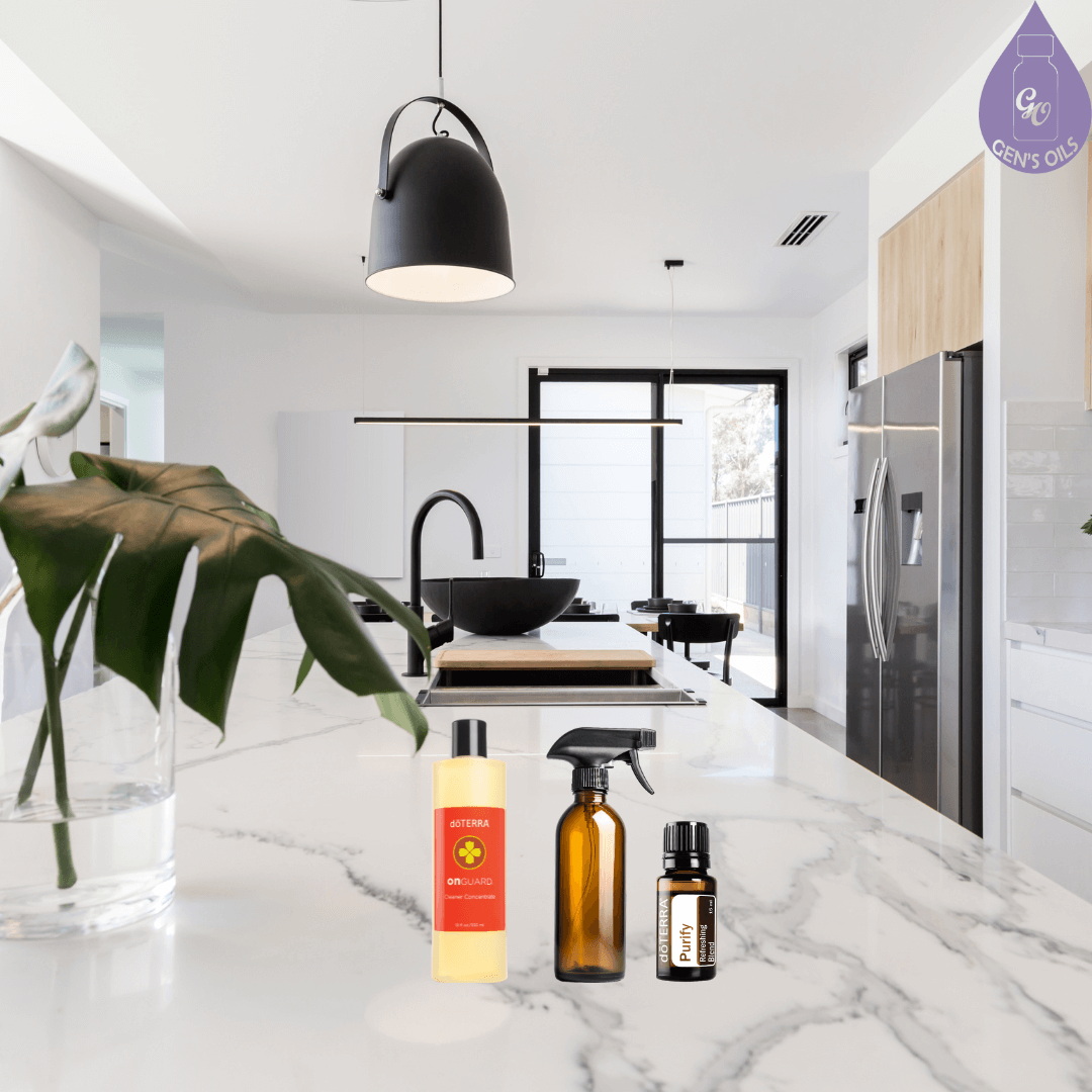 On Guard Cleaner Concentrate, a spray bottle & Purify essential oil on a kitchen bench.