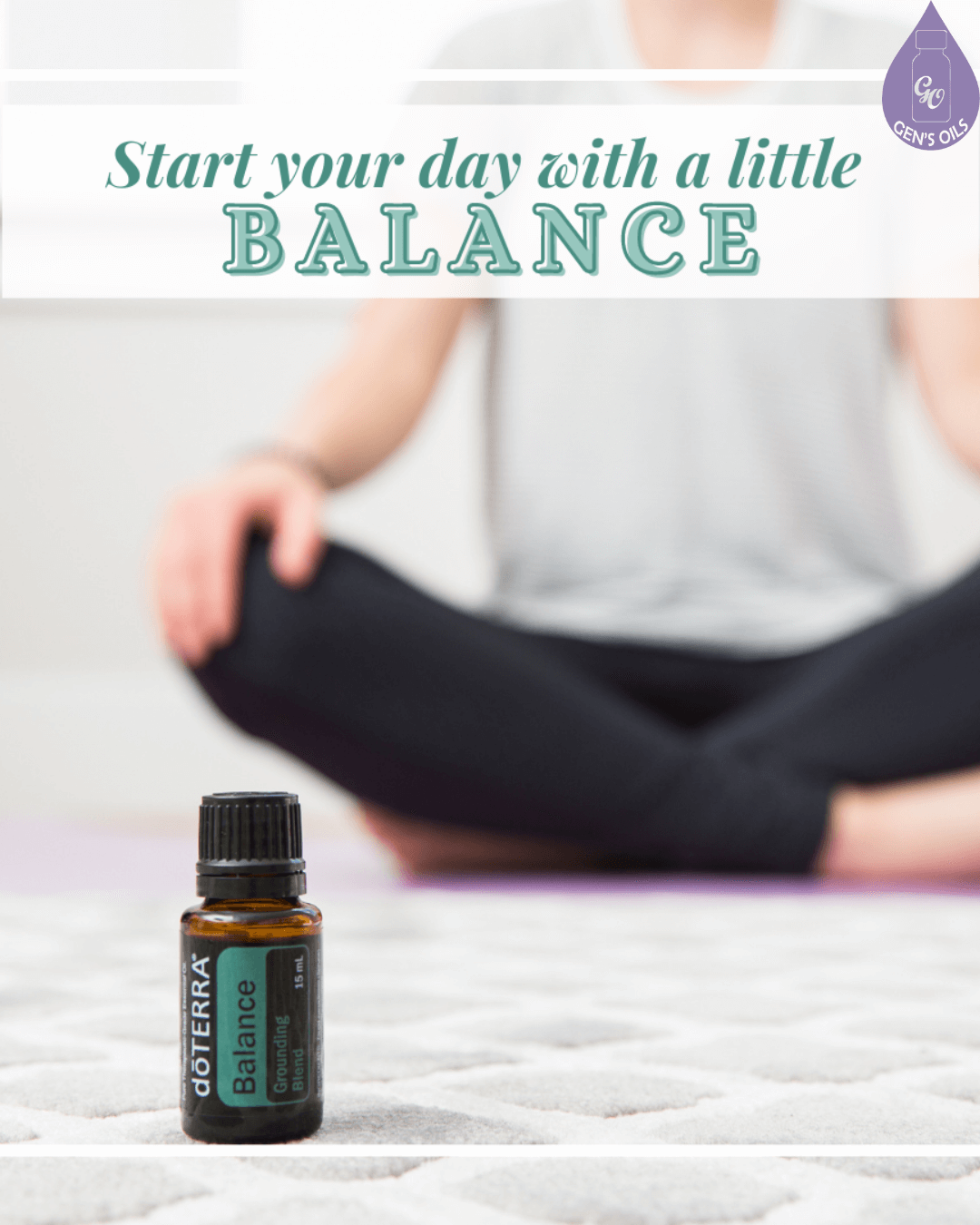 A bottle of doTERRA Balance essential oil sits on a rug in front of a person meditating in a cross-legged pose.