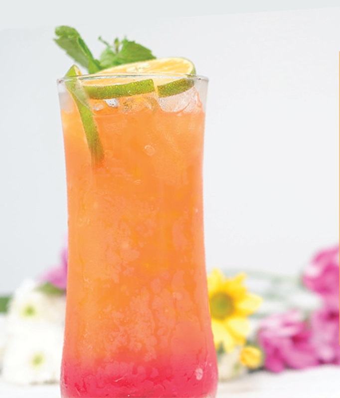 A glass of Tangerine Punch