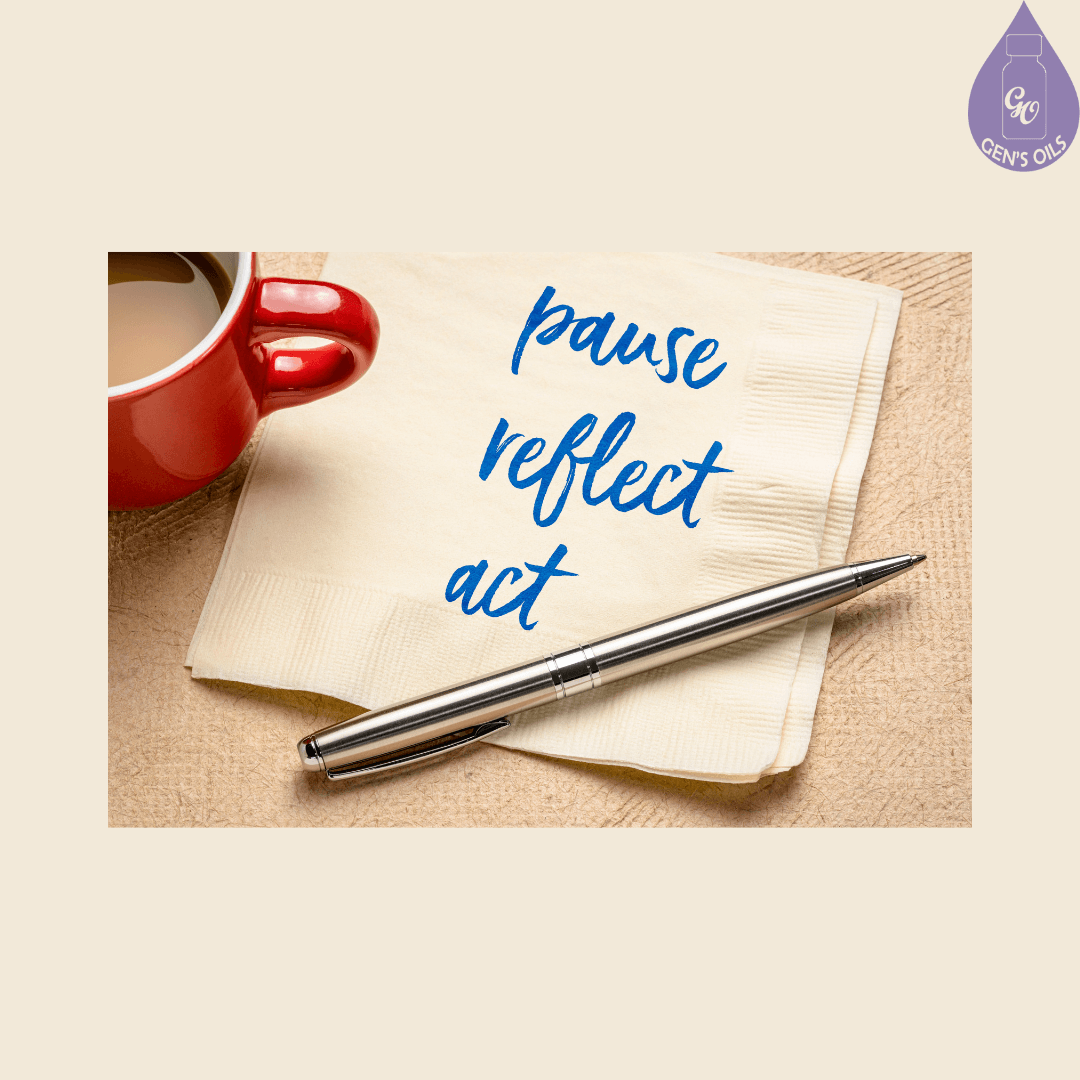 "Pause, Reflect, Act" on a piece of paper with a pen & cup of tea.