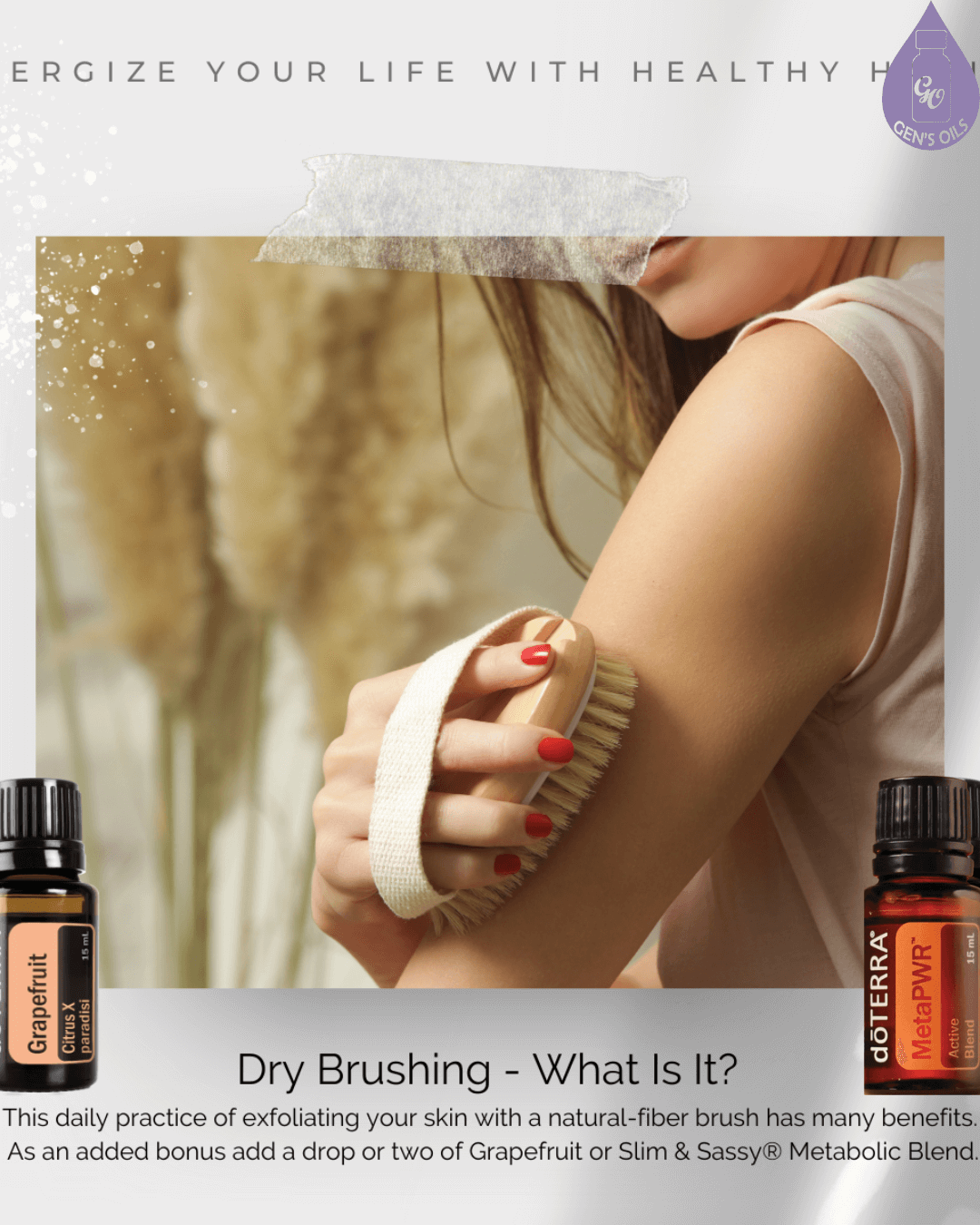 A person dry brushing their arm with a wooden brush, alongside doTERRA grapefruit and MetaPWR Blend essential oil bottles.