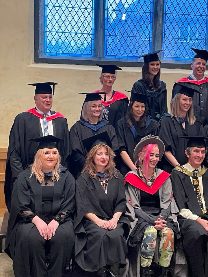 Deanna Thomas graduating with her acupuncture degree