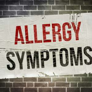 Allergic rhinitis symptoms including sneezing, itchy eyes and nasal congestion