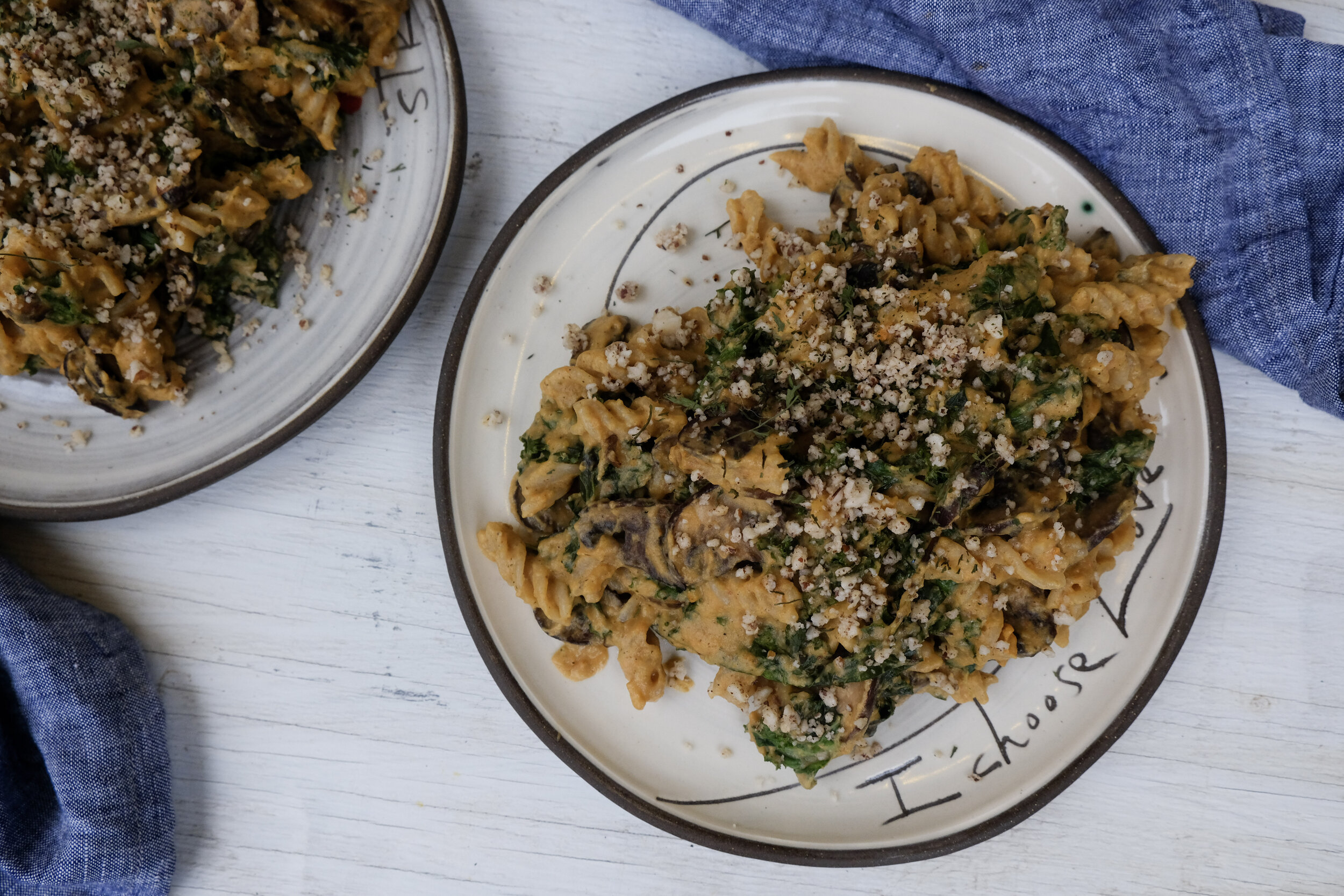 Soup or veggie sauce pasta with Tinkyada organic gluten-free brown rice spirals, sautéed mushrooms amp;amp; kale, topped with Brazil nut parm.  Gorgeous 100% linen napkin made in Brattleboro, VT by  Amsonia Made .