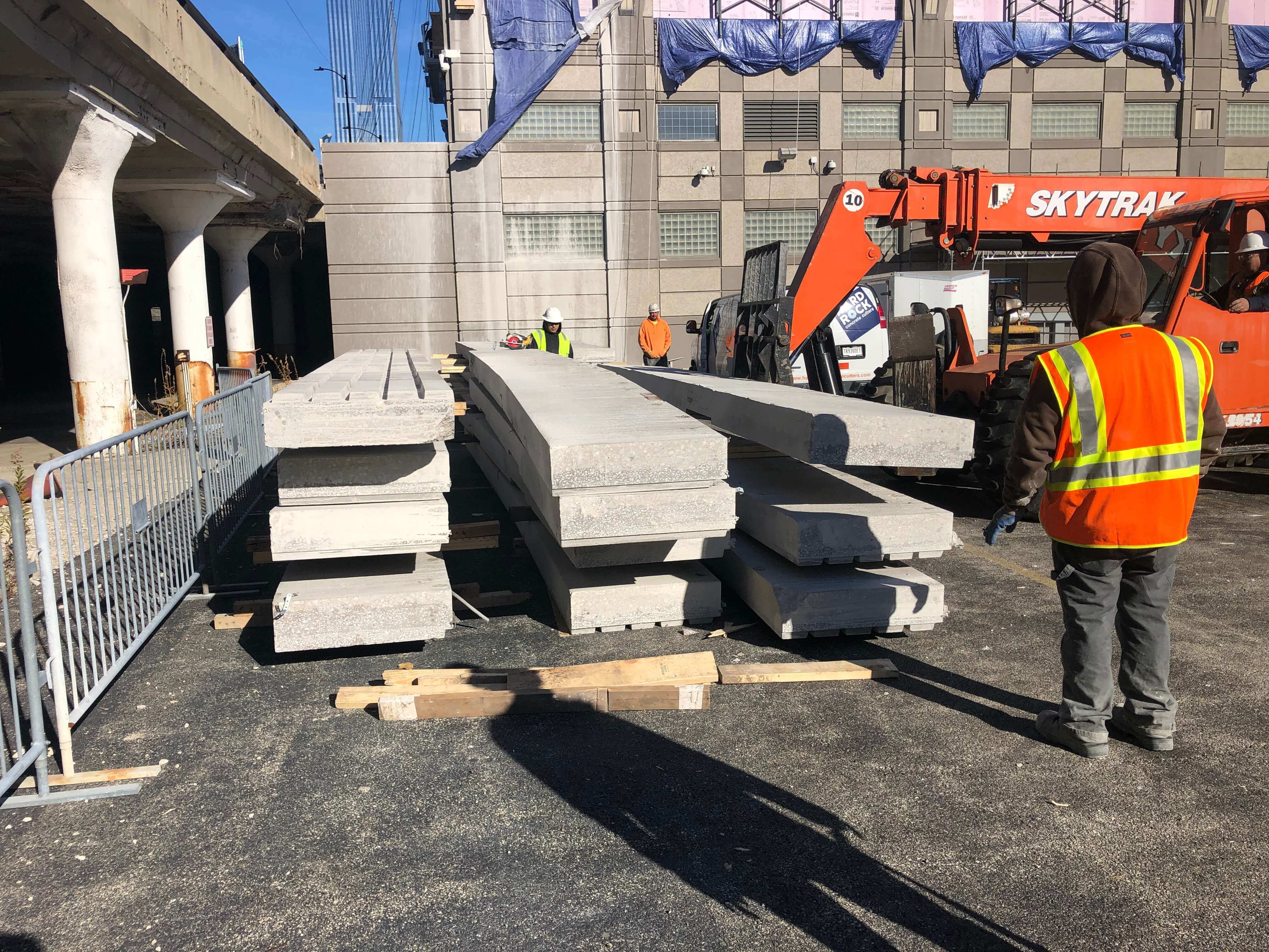 Units stacked next to the building getting ready to construct.