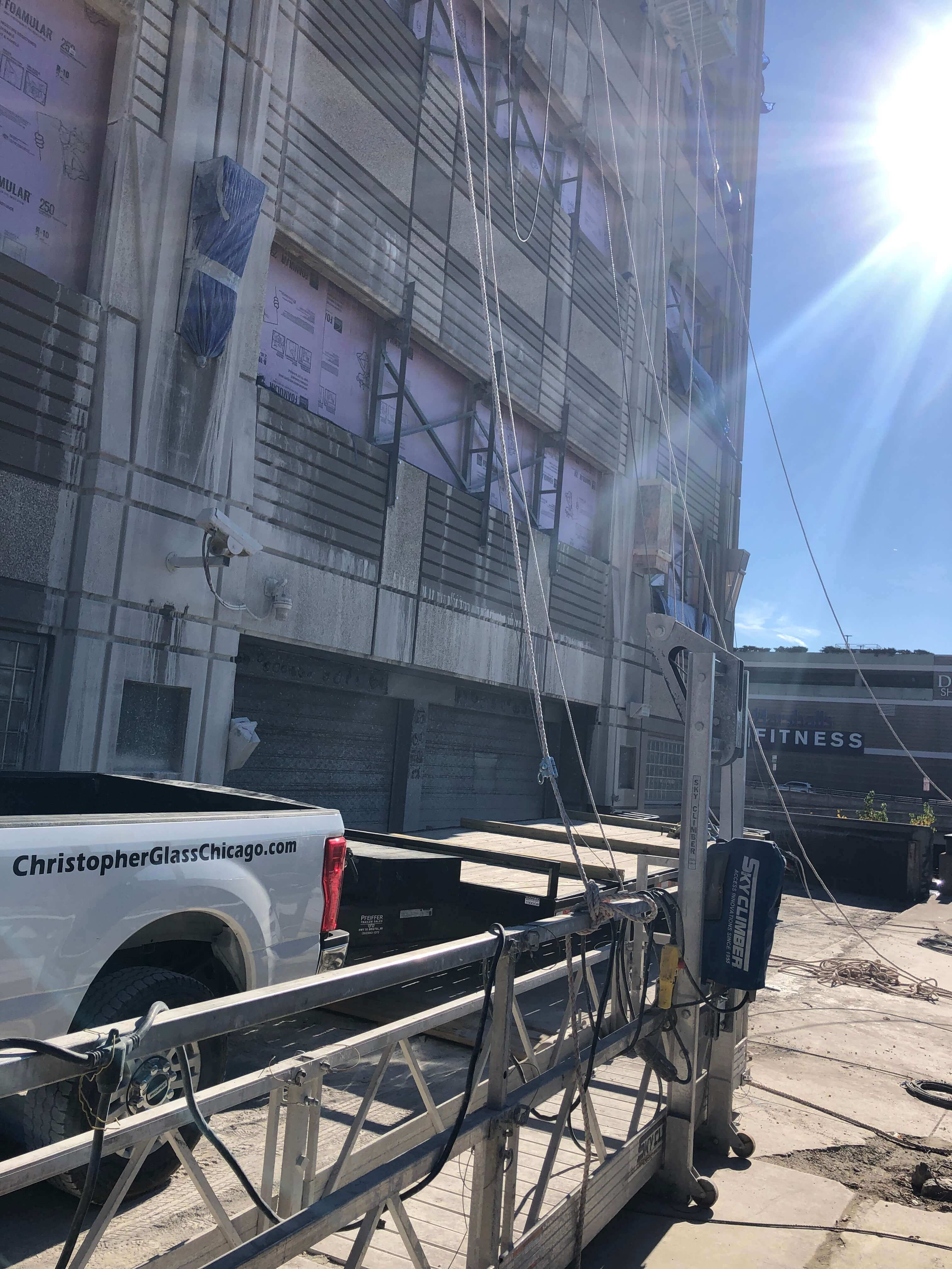 Side of building under construction.