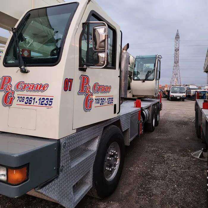 Side view of crane in storage lot.